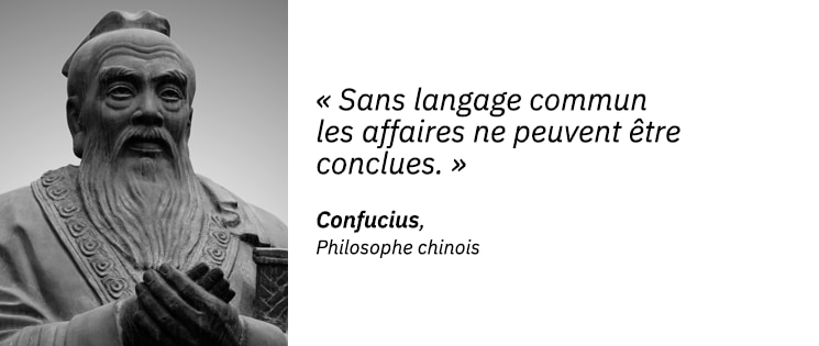 Une statut à l'effigie de Confucius, philisophe chinois, et une citation : "Sans langage commun, les affaires ne peuvent être conclues".